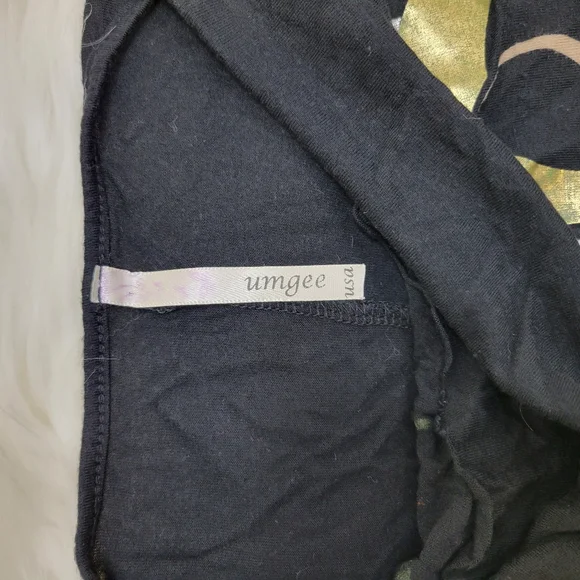 Umgee cold shoulder rushed side soft strechy gold rings top - Picture 4 of 5